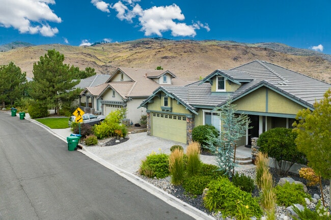 This row of homes in Juniper Trails is backed up completely to desert mountains.