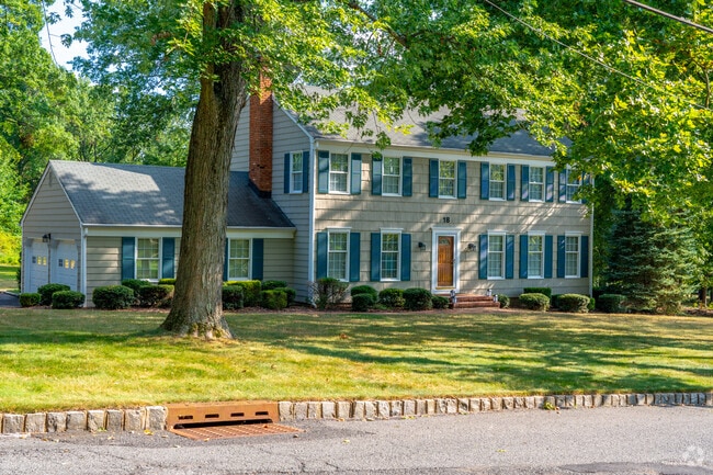 You can find large Colonial homes in Green Knoll.