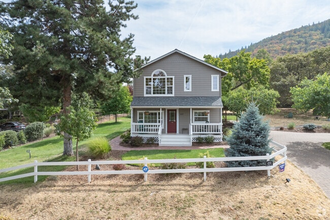 A mid-century home is perched on the hill of Northwest Ashland.