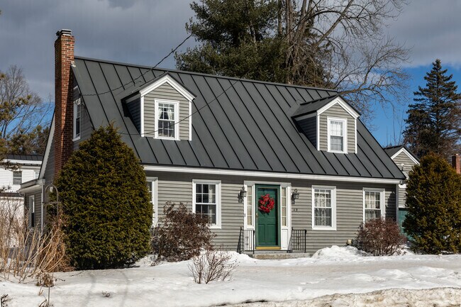 Cape Cod homes are common along the streets of Waterville.