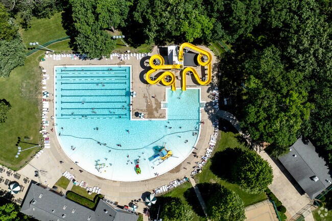 Get a bird's-eye view of aquatic fun - an aerial shot of the pool with thrilling slides.