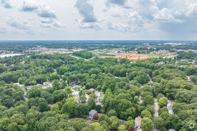 The Thicket neighborhood sits under dense trees.