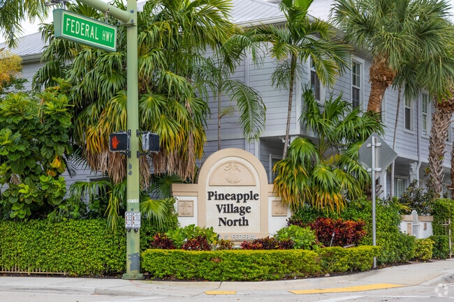 Pineapple Village has a tropical atmosphere and lush greenery.