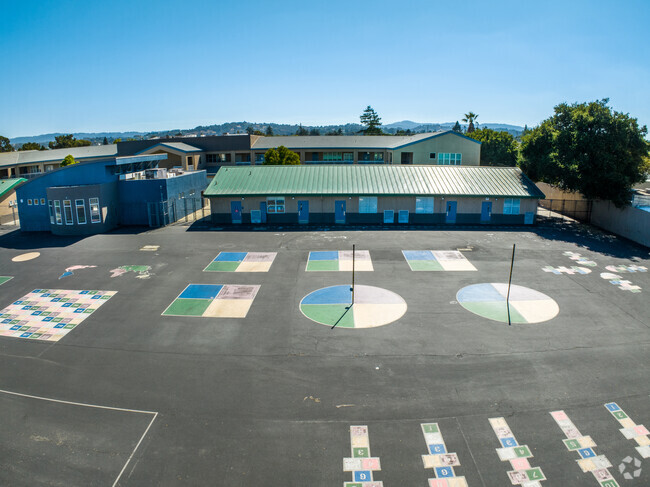 Sunnybrae Elementary blacktop playground has classic games like tetherball and hopscotch.