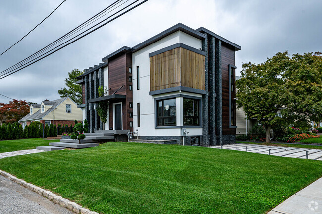 New modern home architecture on many homes in the area in Albertson, NY.