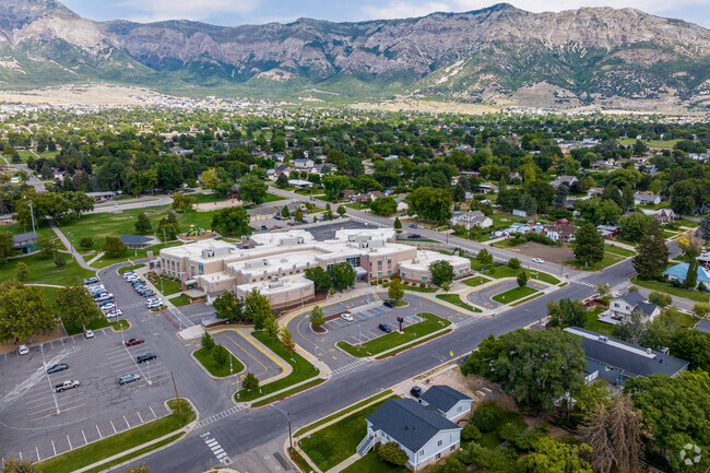 North Ogden Elementary School is situated in a neighborhood with plenty of trees.