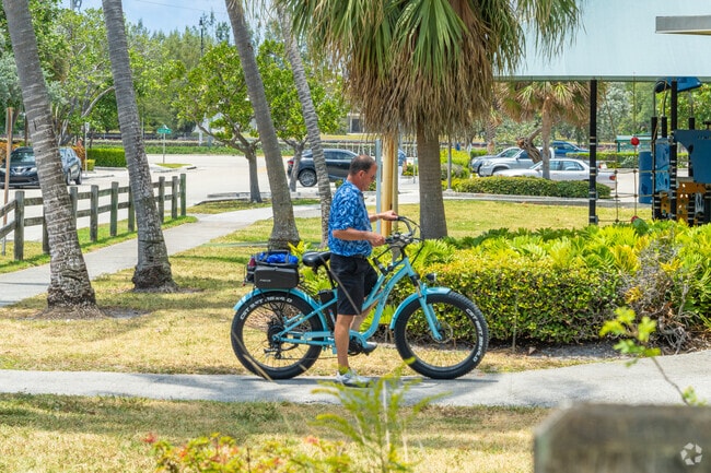 Pedal through Royal Poinciana for a leisurely bike ride.