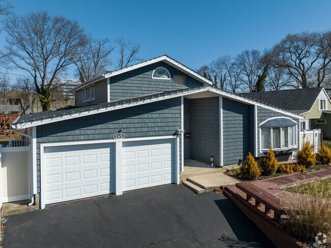 Beautiful Craftsman Home with a Cross Gabled Roof.