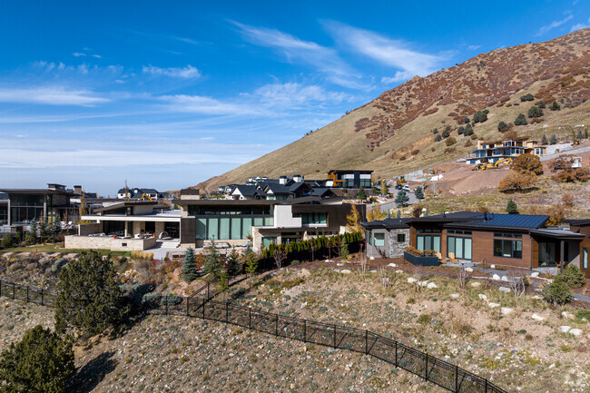 Curves and geometric shapes create interesting lines in this Outlying Salt Lake County mansion.