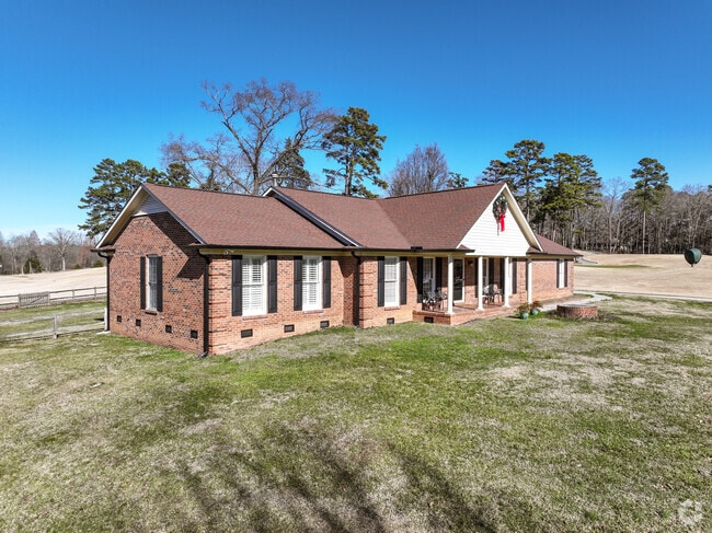 A ranch home located on the Pine Island Golf Course in Moores-Chapel.