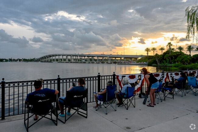 Watch the boats go by along the river in Oak Forest.