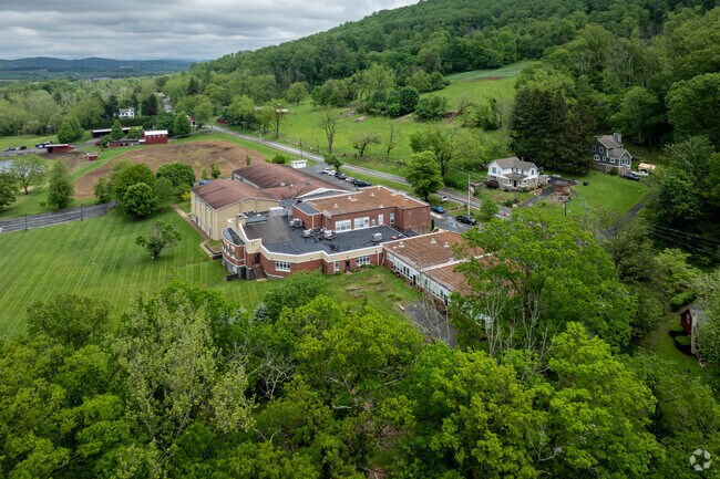 The sun rises over Ethel Hoppock Middle School in Bethlehem, NJ, casting a warm light on a new day of learning and growth.