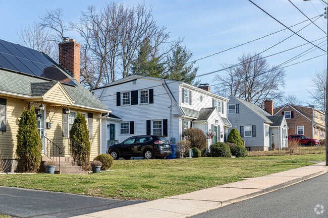 Homes in Buckley District have modest lawns, providing a quaint atmosphere for residents.