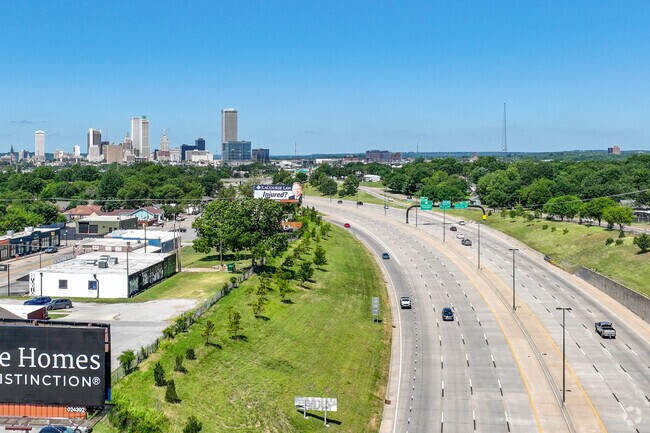 I-244 cuts through Layman-Van Acres toward downtown Tulsa just 10 minutes away.