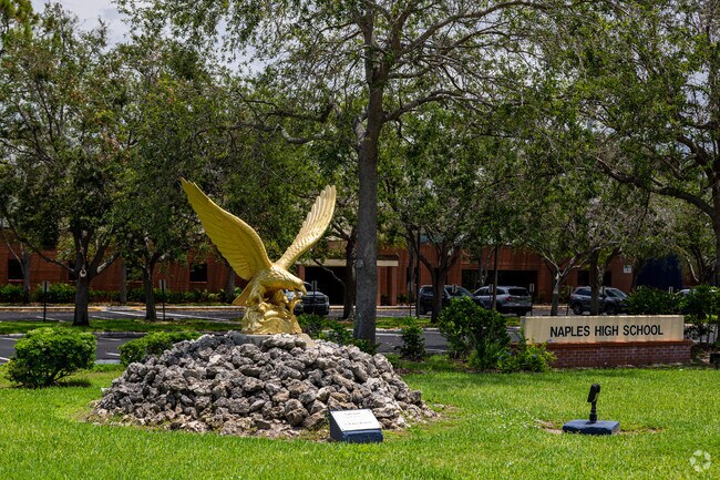 Naples High School features its mascot Golden Eagle statue on the front lawn.
