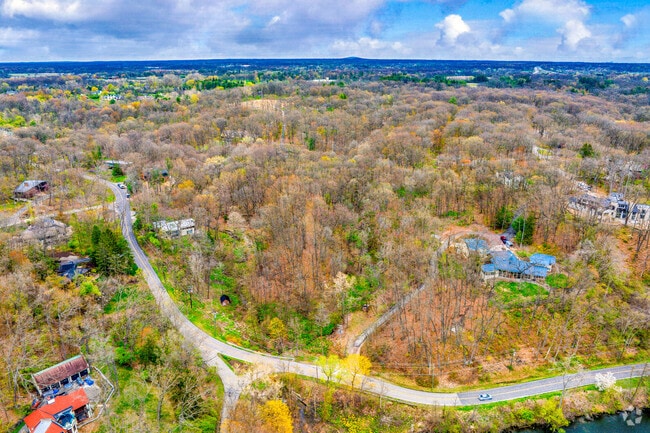 Barton Hills is an affluent area of Ann Arbor with large wooded lots.