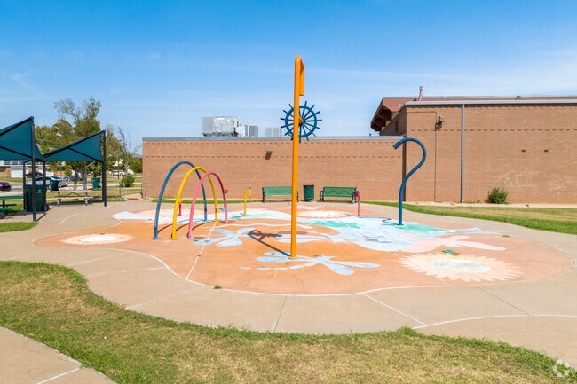 Cool off during the hot summer days at Macklanburg Park's splash pad.