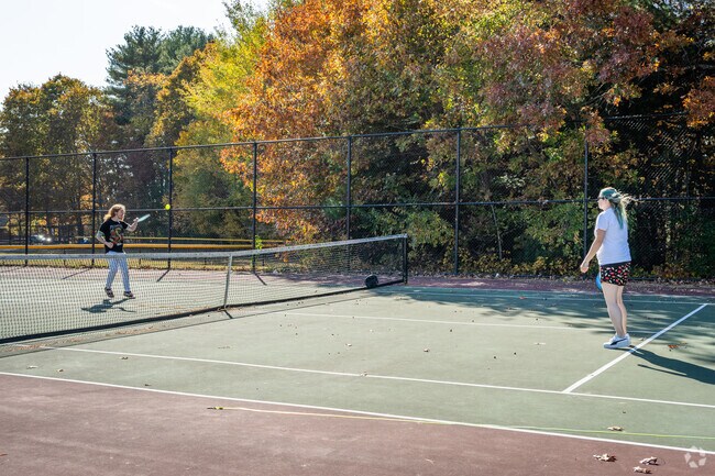 Experience outdoor sports at Oakland Community Complex's tennis courts.