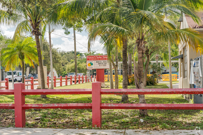 The entrance to Frances S. Tucker Elementary School is lined with beautiful palm trees.