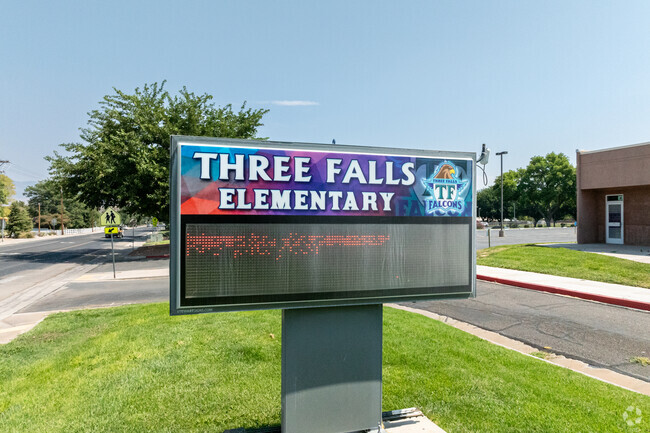 The Falcon mascot represents Three Falls Elementary.