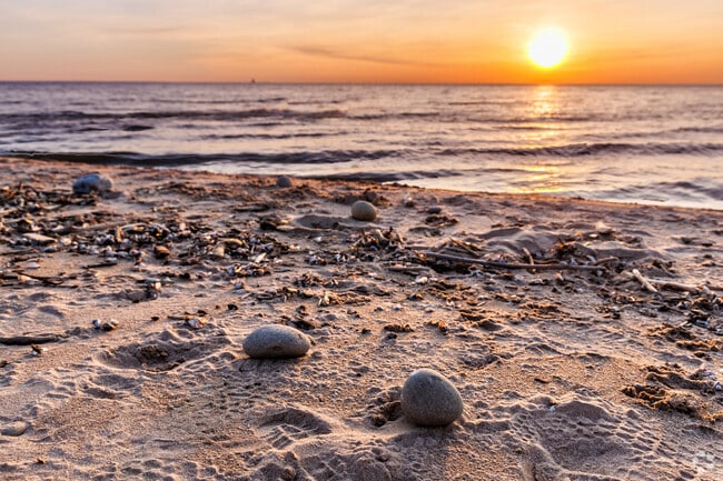Sand, rocks, water, and sunsets are what you will find at Sandy Island Beach State Park.