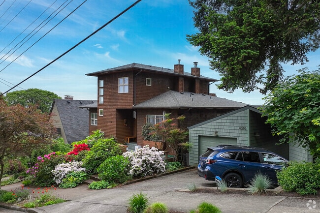 Various northwest contemporary homes feature lush landscaping.