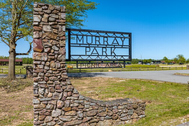 Murray Park is a scenic riverside park with a playground, soccer fields, and volleyball courts.