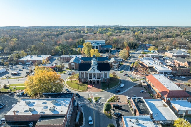 Pittsboro employs many residents in the courthouse and the municipal building behind it.