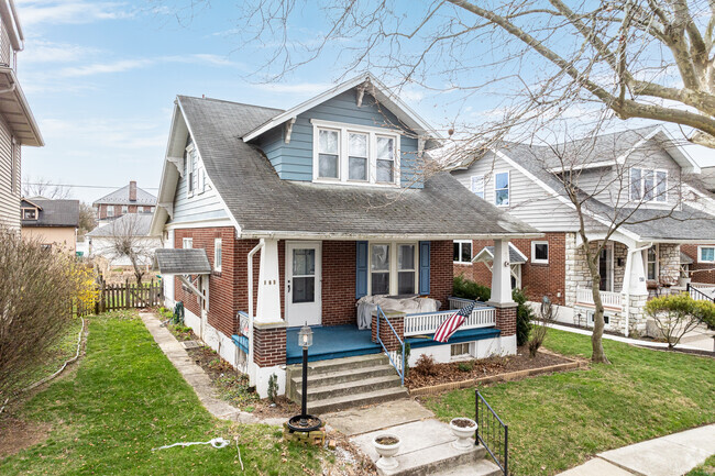 Brick craftsman homes are easy to spot alongside those covered in siding.