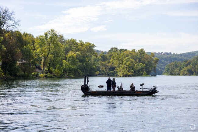 Calm waters of Table Rock Lake attract boaters and vacationers throughout the summer.