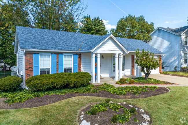 Discover the allure of Harvester's cozy and inviting residential landscapes.