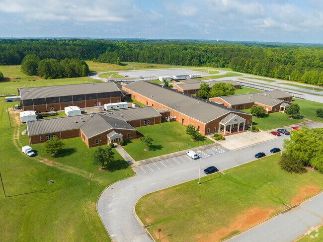 Madras Middle School has a large campus with green landscapes.