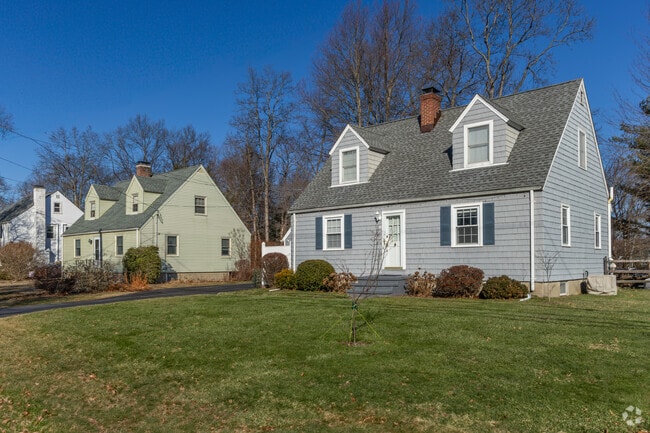 Explore charming Cape Cod homes in Lake Mohegan Hills starting at around $650,000.