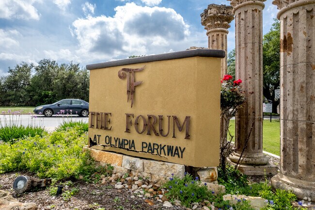 View of the entrance sign to The Forum shopping center in Selma, TX.