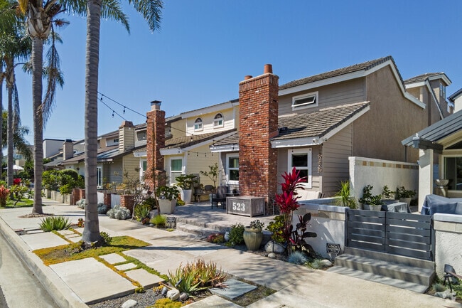 Beach cottages with brick chimneys in Downtown Huntington Beach.