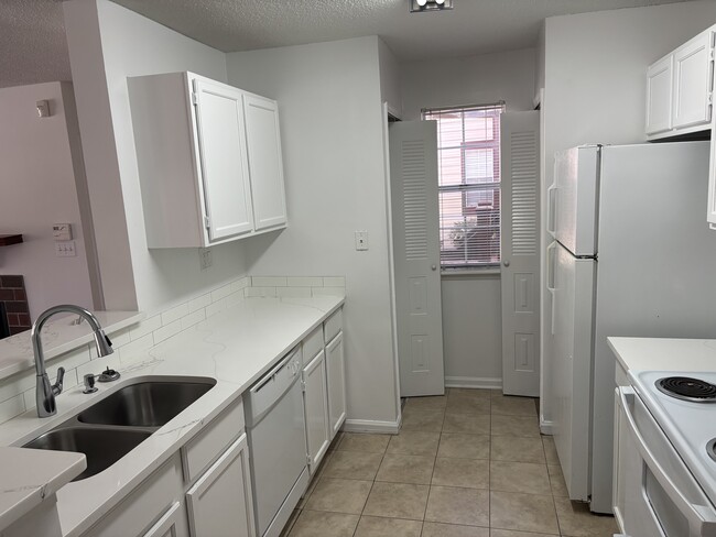 Kitchen, view to laundry and pantry