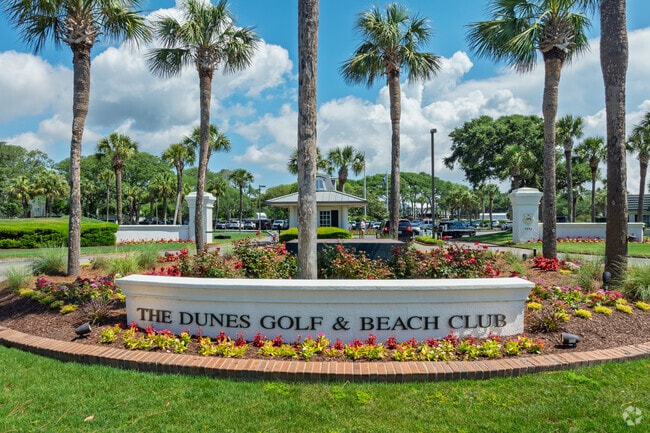 The Dunes Golf & Beach Club in Grande Dunes offers exclusive coastal golf experiences.
