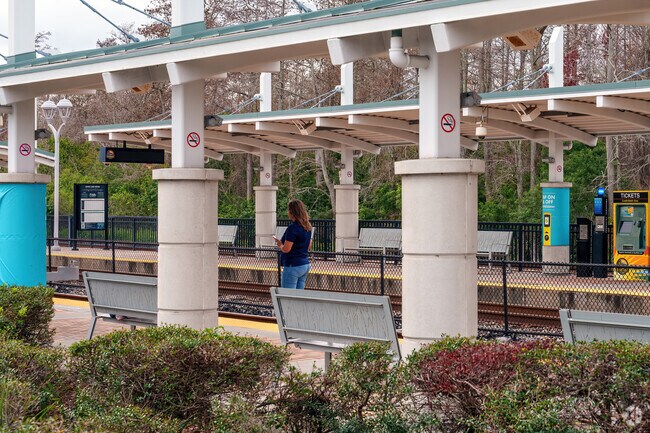 Minutes away, a Lake Conway resident rides the SunRail for convenient transportation.