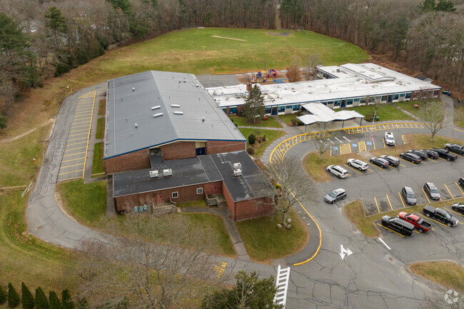 A covered entrance welcomes students to John F. Kennedy Memorial School.