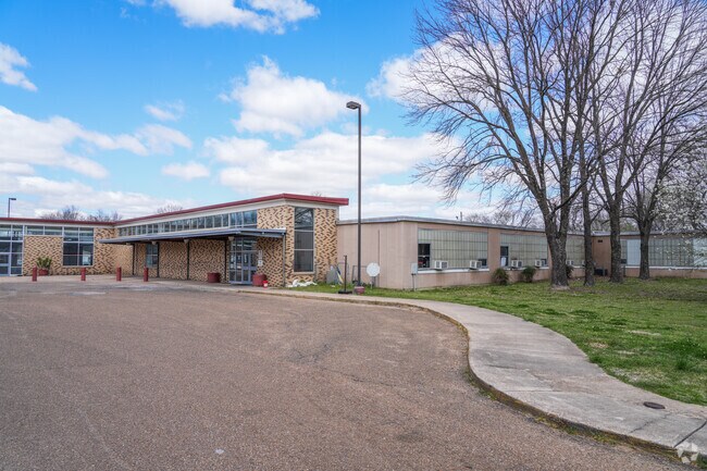 Bettie E. Woolfolk Middle School serves students grades 6 through 8.