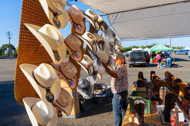 Colorful hats are displayed for sale at the Madera Flea Market in North Madera.