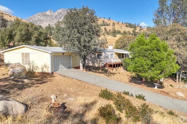 Homes are often covered by trees and thick bushes in Wofford Heights.
