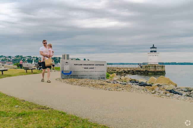 Locals walk along the path that coasts South Portland and Bug Light Park.