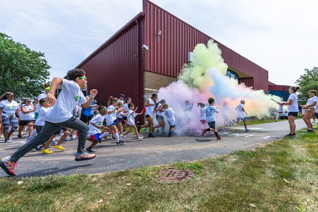 Runners take off at the Color Run in East Romeoville.