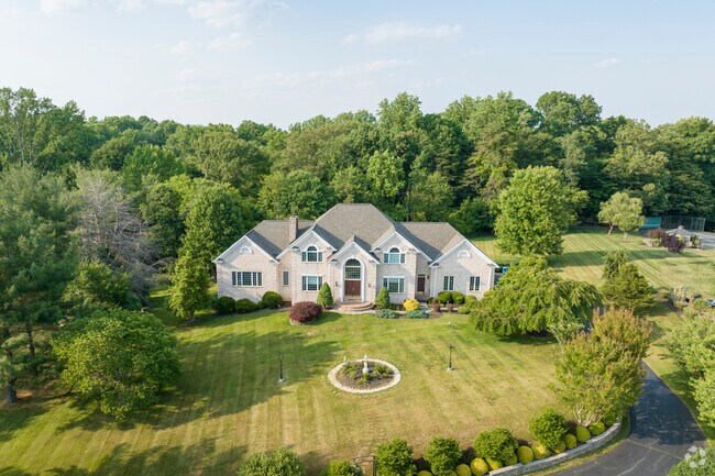 Gorgeous estates stand on large lots in the Great Falls neighborhood.