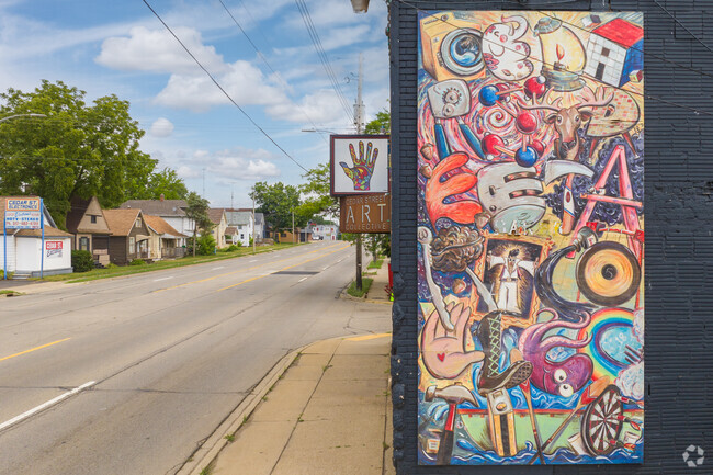 Mural on the side of Cedar Street Art Collective on S Cedar St in Holmes Street Area in Lansing.