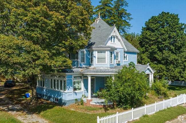 Step back in time in a colorful Victorian home tucked away in the shade in Salem.