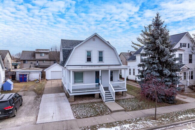 A Dutch Colonial home one of Downtown Oshkosh queit streets.