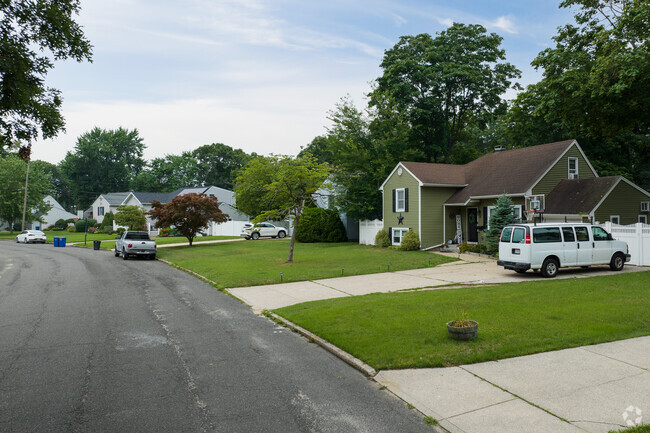 Suburban landscapes unfold in charming Centereach.