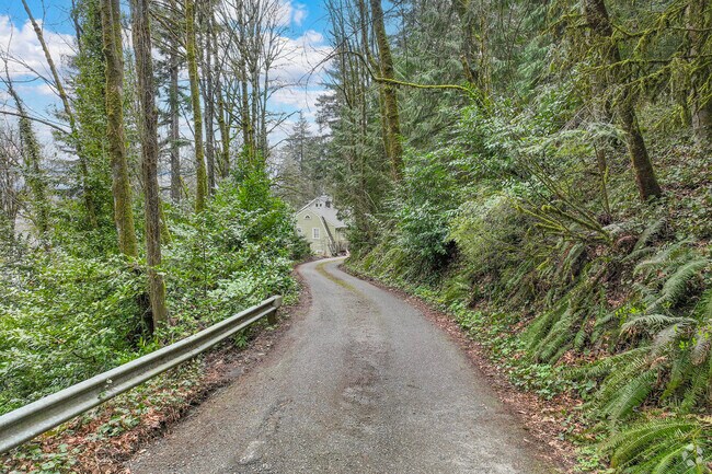 Native plants and trees line the windy residential streets of Linnton.